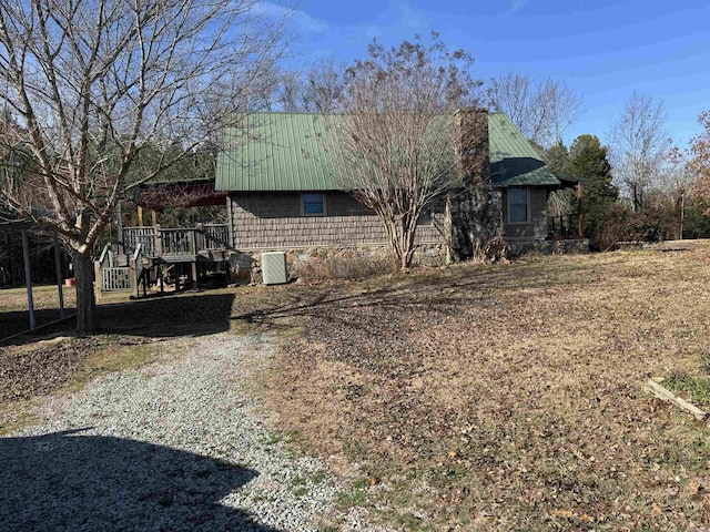 view of front of home featuring cooling unit