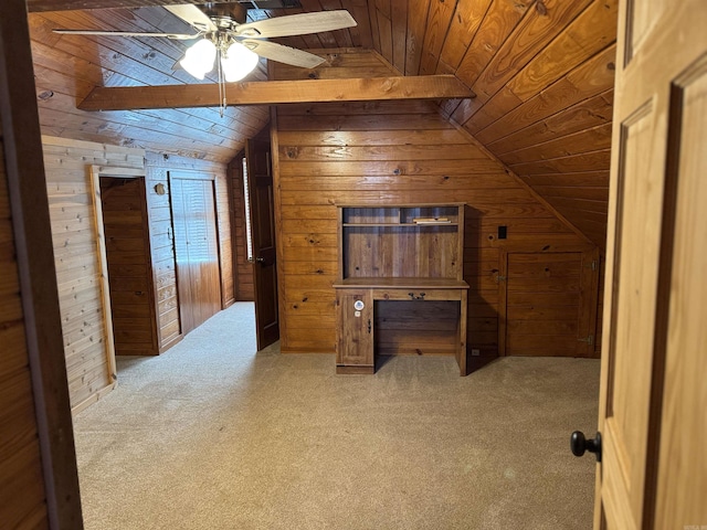 additional living space featuring carpet flooring, ceiling fan, wooden ceiling, vaulted ceiling, and wooden walls