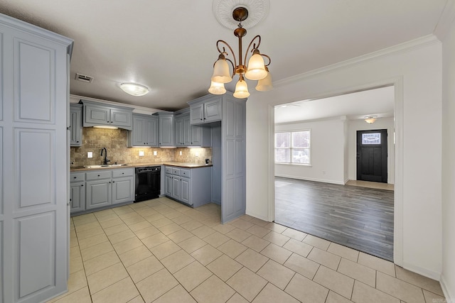 kitchen featuring pendant lighting, an inviting chandelier, light hardwood / wood-style flooring, black dishwasher, and gray cabinets