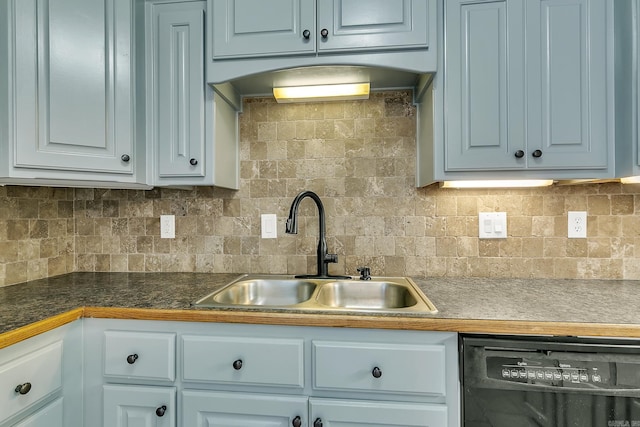 kitchen with dishwasher, decorative backsplash, and sink