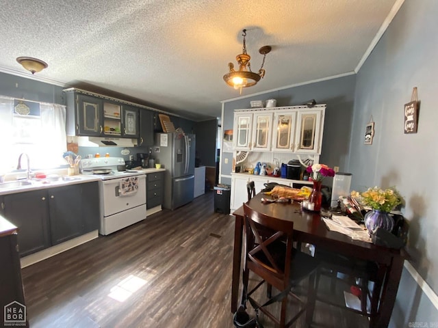 kitchen with stainless steel fridge, a textured ceiling, sink, electric range, and dark hardwood / wood-style floors