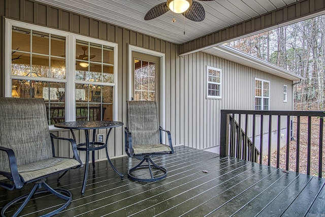 wooden deck with ceiling fan