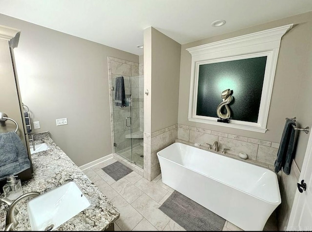 bathroom featuring tile patterned flooring, vanity, and independent shower and bath