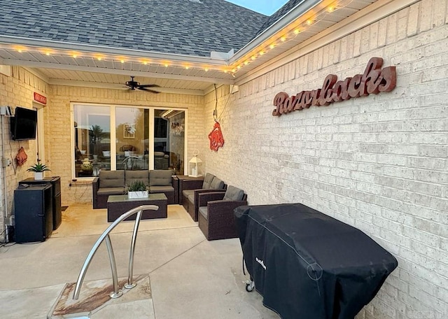 view of patio / terrace featuring ceiling fan and an outdoor living space