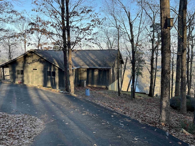 view of front of home featuring cooling unit