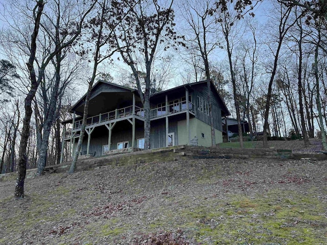 rear view of house with a balcony