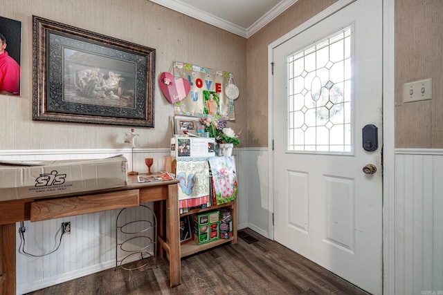 entryway featuring dark hardwood / wood-style flooring and crown molding