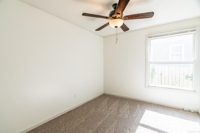 unfurnished room featuring carpet flooring and ceiling fan