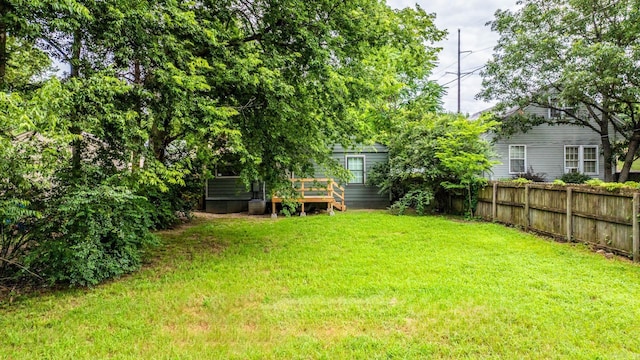 view of yard with a deck