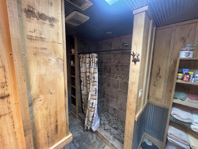 bathroom with a shower with shower curtain