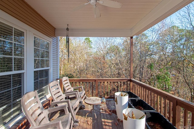 wooden deck with ceiling fan