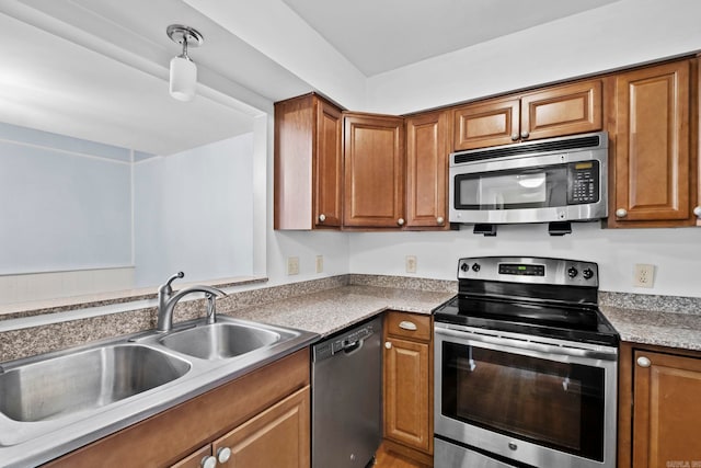 kitchen featuring stainless steel appliances and sink