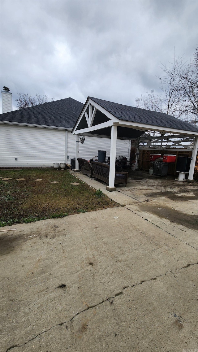 view of parking featuring a carport