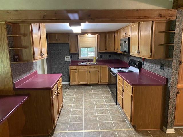 kitchen featuring decorative backsplash, sink, and white electric range oven