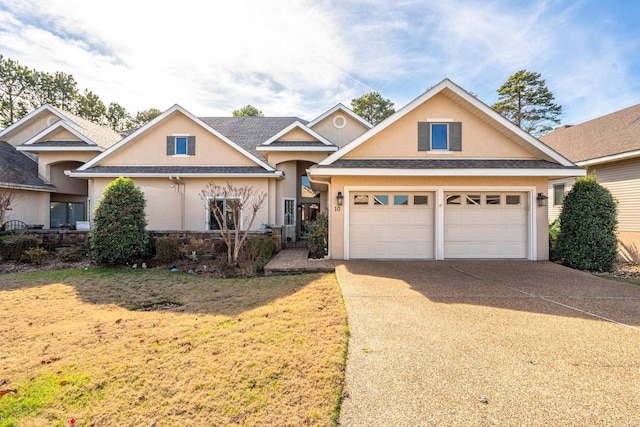 view of front facade with a front lawn and a garage