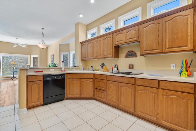 kitchen with dishwasher, hanging light fixtures, ceiling fan, cooktop, and kitchen peninsula