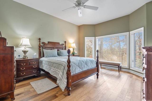 bedroom with ceiling fan and light hardwood / wood-style floors