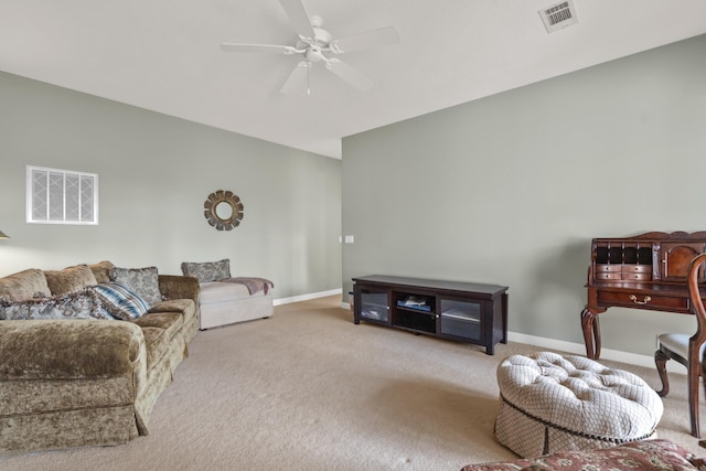 carpeted living room featuring ceiling fan