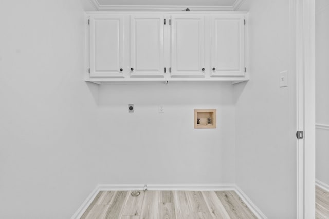 laundry area featuring hookup for an electric dryer, light hardwood / wood-style floors, and hookup for a washing machine