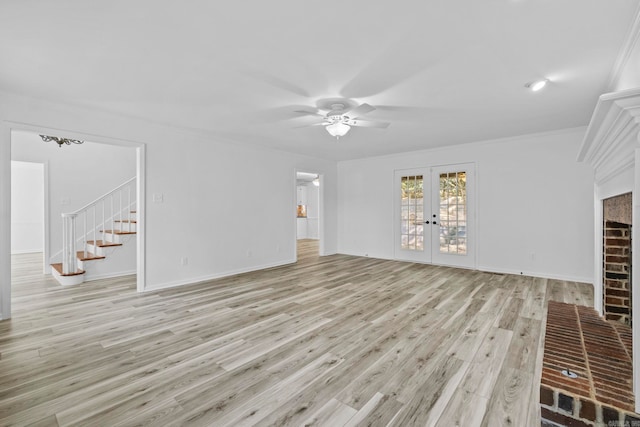 unfurnished living room featuring ceiling fan, french doors, crown molding, and light hardwood / wood-style flooring