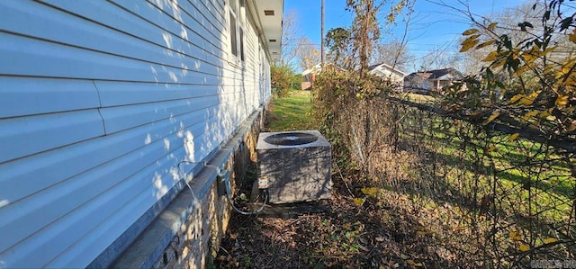 view of home's exterior featuring central AC unit