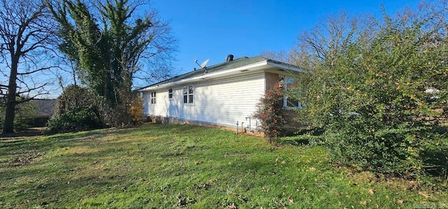 view of home's exterior featuring a lawn