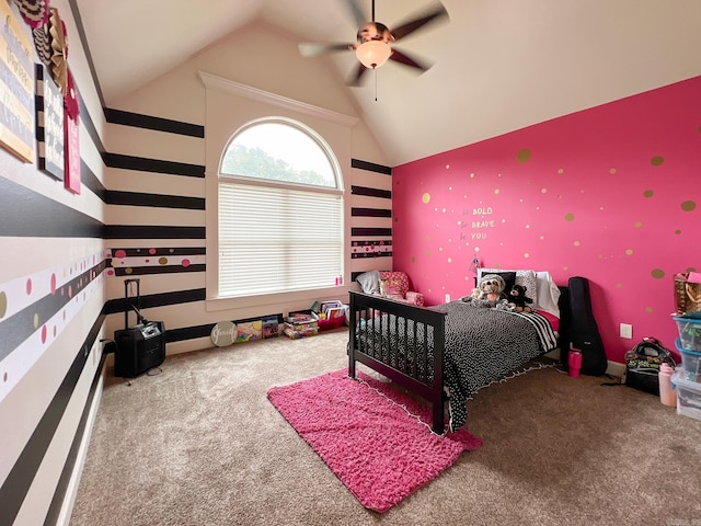 carpeted bedroom featuring ceiling fan and vaulted ceiling