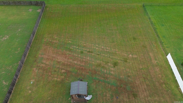 birds eye view of property featuring a rural view