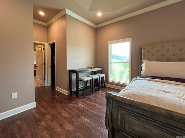 bedroom with crown molding and dark wood-type flooring