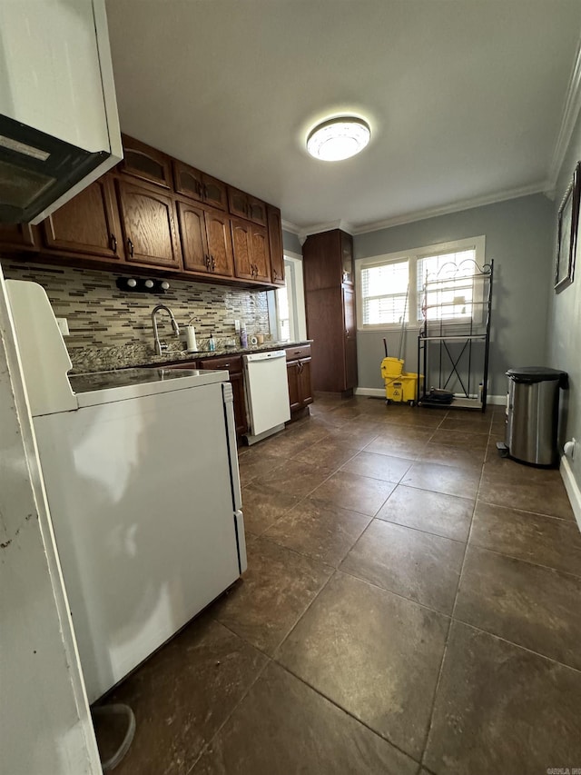 kitchen with stove, tasteful backsplash, ornamental molding, white dishwasher, and extractor fan