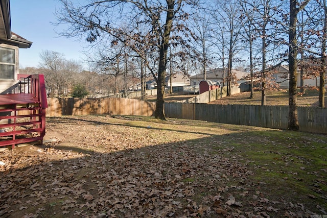 view of yard featuring a deck