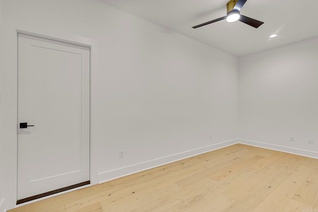 unfurnished room featuring recessed lighting, ceiling fan, baseboards, and wood finished floors