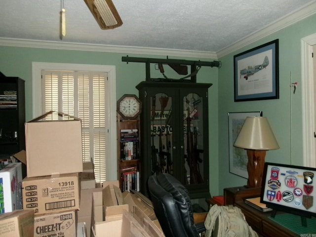 interior space with ornamental molding and a textured ceiling