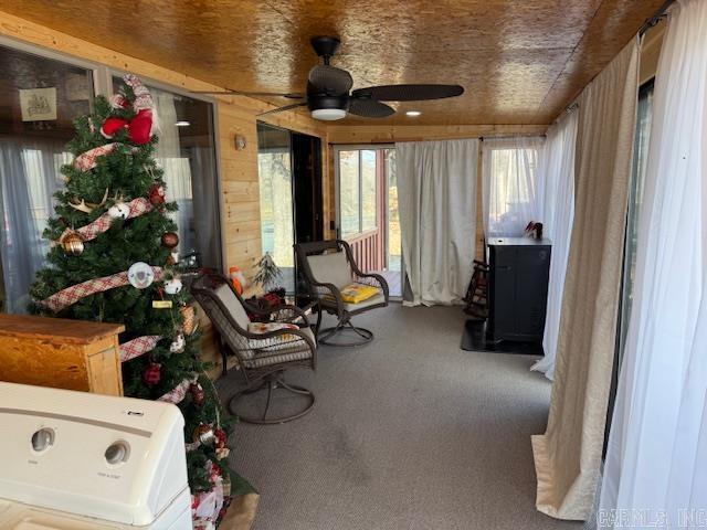 sunroom / solarium with ceiling fan