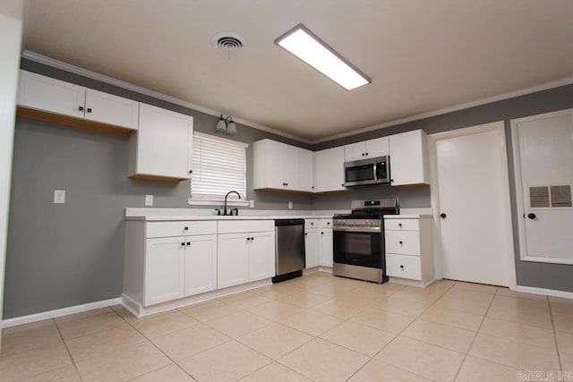 kitchen with white cabinets, sink, and stainless steel appliances