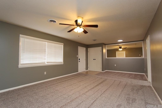 empty room with carpet flooring