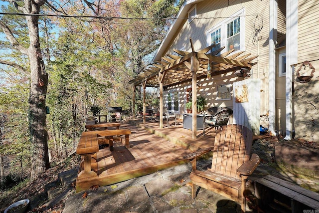 view of patio / terrace with a pergola and a deck