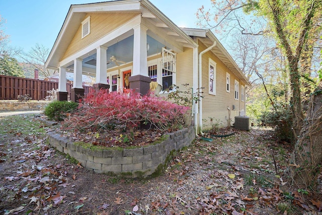 view of side of property with central AC unit