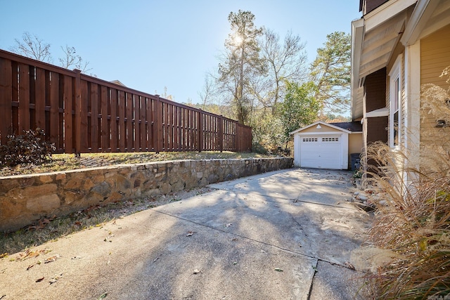 exterior space featuring an outdoor structure and a garage