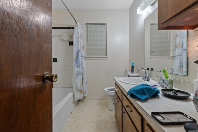 full bathroom with shower / tub combo, vanity, and toilet