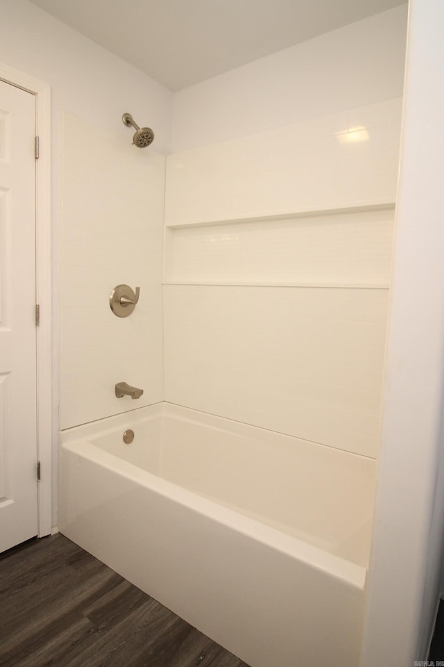 bathroom featuring shower / bathing tub combination and wood-type flooring