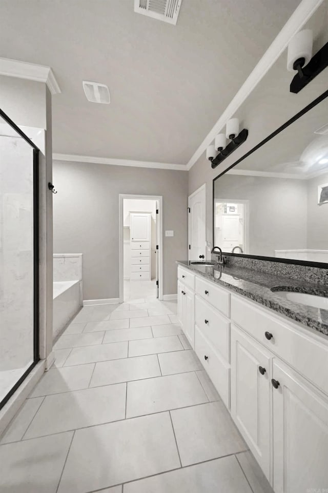 bathroom with plus walk in shower, tile patterned flooring, vanity, and crown molding