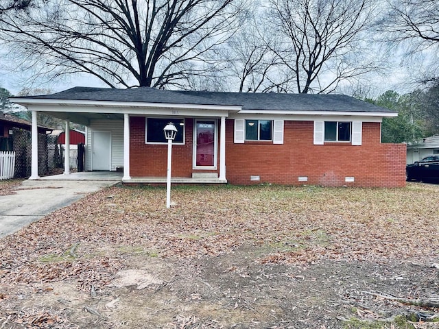 view of front of house with a carport