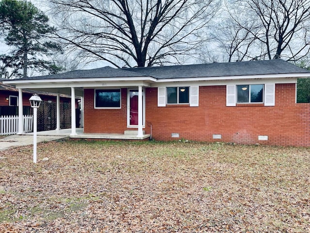 view of front facade with a carport