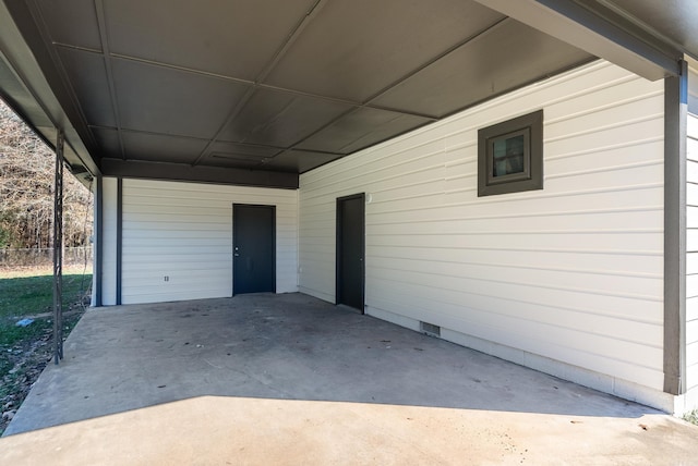 view of patio / terrace featuring a carport