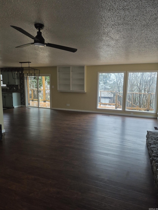 unfurnished room featuring dark hardwood / wood-style flooring and ceiling fan