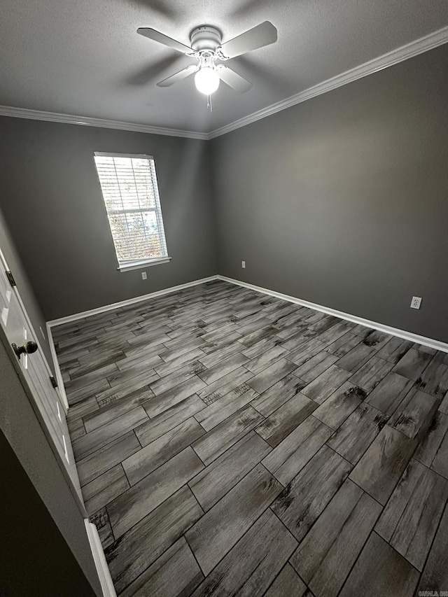 unfurnished room featuring a textured ceiling, ceiling fan, and ornamental molding