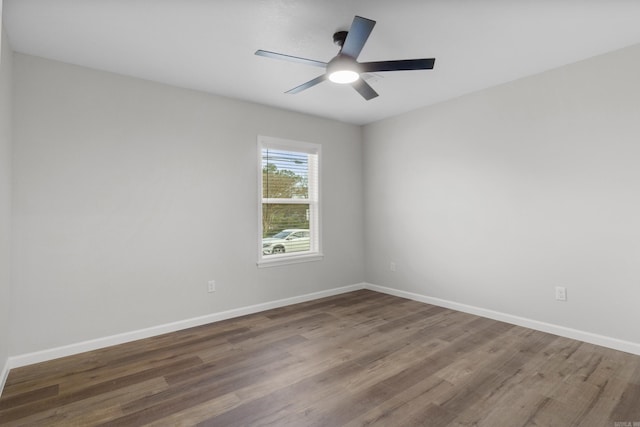 unfurnished room featuring ceiling fan and wood-type flooring