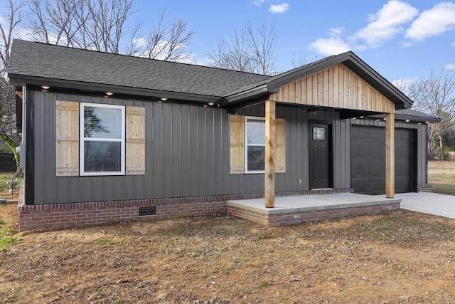 view of front of home featuring a garage