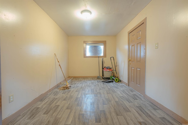 spare room featuring light hardwood / wood-style floors